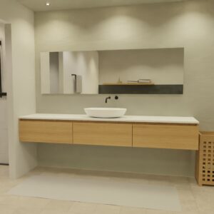 Maatwerk design badkamermeubel, gemaakt van eiken hout fineer of eiken hout massief met een blad van solid surface en 1 waskom van Solid Surface. Het front te openen d.m.v. Greeplijst boven